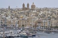 Boats moored alongside Fort Saint Angelo in Valetta, Malta Royalty Free Stock Photo