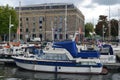 Boats Moored at a City Harbour