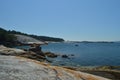 Boats Moored In The Estuary In Front Of The Horse Point Lighthouse On Arosa Island. Nature, Architecture, History, Travel. August