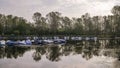 Boats moored in a harbour of the Ticino river Royalty Free Stock Photo