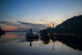 Boats moored on a jetty during sunset Royalty Free Stock Photo