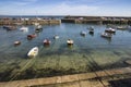 Boats moored in Mousehole harbour in Cornwall