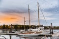 Boats moored near the dock at sunset. Maine, USA. Royalty Free Stock Photo