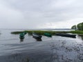 Boats are moored near the shore of lake Pleshcheyev. Royalty Free Stock Photo