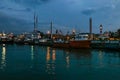 Boats moored in seaport dock near Batumi sea station. Night view from Black sea Royalty Free Stock Photo