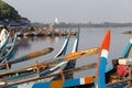 Boats moored at Taungthaman Lake near Amarapura in Myanmar by the U Bein Bridge Royalty Free Stock Photo