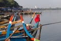 Boats moored at Taungthaman Lake near Amarapura in Myanmar by the U Bein Bridge Royalty Free Stock Photo