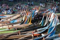 Boats moored at Taungthaman Lake near Amarapura in Myanmar by the U Bein Bridge Royalty Free Stock Photo