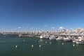 Boats moored at the yacht club pier