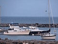 Boats near Breakers Royalty Free Stock Photo