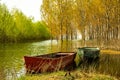 Boats near lake in front of forest Royalty Free Stock Photo