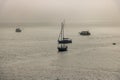 Boats In Ocean On Foggy Morning Royalty Free Stock Photo