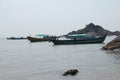 Boats at Om Beach at Gokarna on a sunny day - Arabian sea - Indian beach holiday