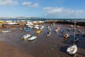 Boats in Paignton harbour Devon England with view to Torquay