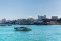 Boats in Pattaya sea, and urban city with blue sky for travel background, Chonburi, Thailand