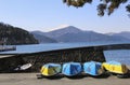 Boats on the pier of Lake Ashi and the top of Mount Fuji covered with snow, Japan Royalty Free Stock Photo