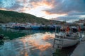 Boats and boats at the pier at sunset .  Crimea Royalty Free Stock Photo