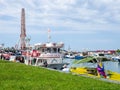 Boats and boats in the port of Batumi. Ships in the harbor. Moored to the shore of the court. Resort place. Transport for