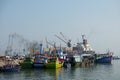 Boats at Qui Nhon Fish Port, Vietnam in the morning. Royalty Free Stock Photo