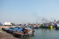 Boats at Qui Nhon Fish Port, Vietnam in the morning. Royalty Free Stock Photo