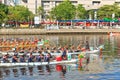 Boats racing in the Love River for the Dragon Boat Festival in Kaohsiung, Taiwan. Royalty Free Stock Photo