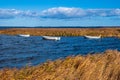 Boats and reeds on the island Moen on the Baltic Sea in Denmark Royalty Free Stock Photo