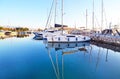 Boats reflected on sea Faliro Greece