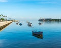 Boats rest on pretty blue sea in Havana, Cuba.