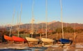 Boats resting on the beach in their parking area waiting for the summer Royalty Free Stock Photo