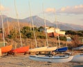Boats resting on the beach in their parking area waiting for the summer Royalty Free Stock Photo