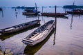 Early morning sketch by the foggy lake with boats Royalty Free Stock Photo