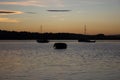 Boats on the river Exe near Lympstone, Devon at sunset. Royalty Free Stock Photo