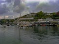 Boats on the river in the small coastal town of Looe in Cornwall