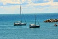 Boats, rocks, Salivoli, in Livorno, Tyscany, Italy Royalty Free Stock Photo