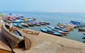 Boats on sacred river Ganges foggy morning. Varanasi Royalty Free Stock Photo