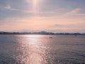 Boats sailing in the Cantabrian Sea at sunset Royalty Free Stock Photo