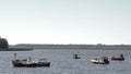 Boats sailing on the Santa Lucia river in Uruguay