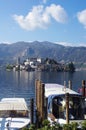 Boats and Saint Giulio island on Orta lake Royalty Free Stock Photo