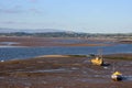 Boats on sand, low tide, looking towards Hest Bank Royalty Free Stock Photo