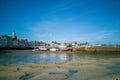 Boats on the sand at low tide, village of the Croisic on Guerande peninsula France Royalty Free Stock Photo