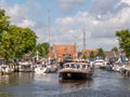 Boats seeking mooring in Het Dok canal, Lemmer, Friesland, Netherlands