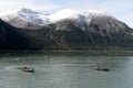 Boats from the ship Via Australis in the Bay of the Pia glacier. Royalty Free Stock Photo