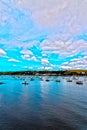 Boats and ships moored in a small port, in the background coastal town, fishing industry and tourism, HDR photo Royalty Free Stock Photo