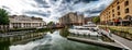 Boats And Ships In St Katharine Docks With Office Buildings And Restaurants In London, UK