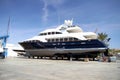 Motor vessel in drydock prepared for maintenance.