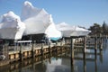 Boats shrin wrapped and stored for winter Royalty Free Stock Photo