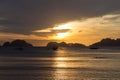 Boats silhouette in the sea on sunset and isles background. Traditional Philippines fishing boat at sunset. Royalty Free Stock Photo