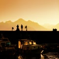 people at harbor during sunset Royalty Free Stock Photo