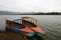Boats in Situ Cileunca, Pangalengan, West Java, Indonesia. The atmosphere of Lake Cileunca Royalty Free Stock Photo