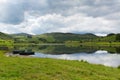 Boats and still water Watendlath Tarn Lake District Cumbria England UK Royalty Free Stock Photo